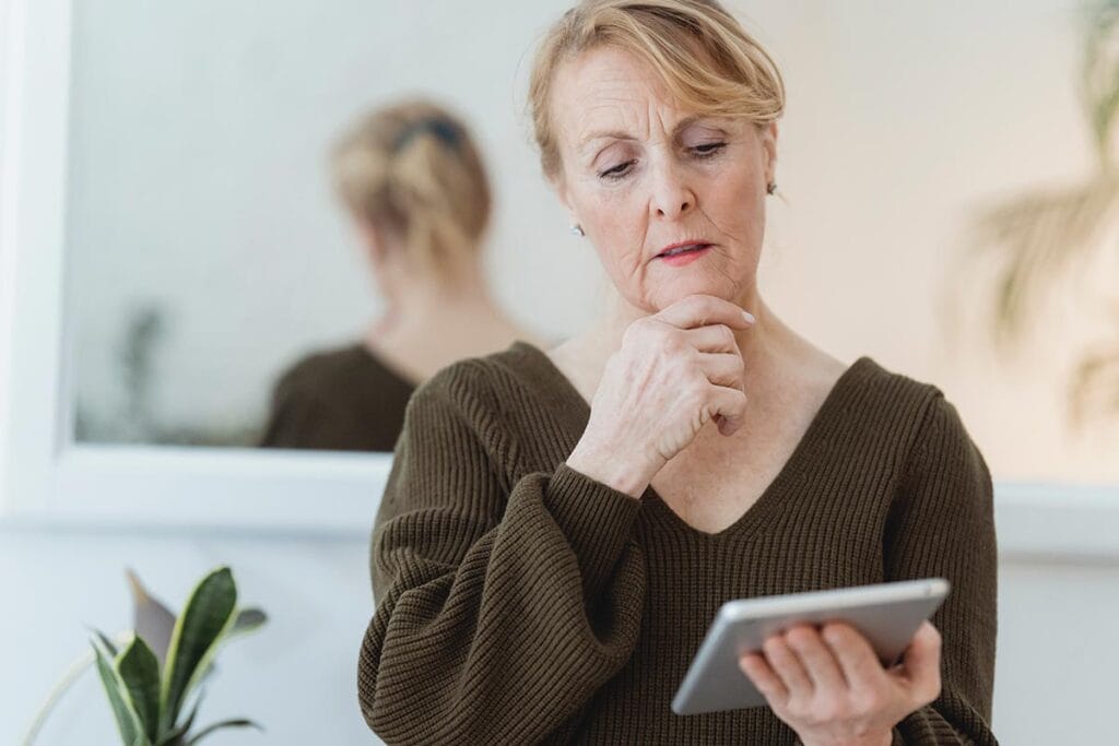 woman looking at a tablet