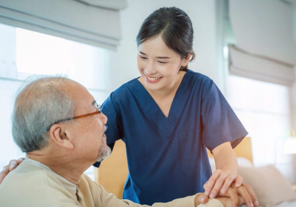 caregiver hold hand of senior man patient give comfort,express h